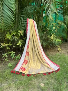 Beige Golden Floral Saree with Red Striped Border and Tassel Detailing