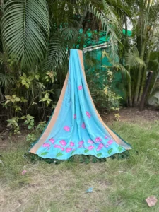 Sky Blue Saree with Pink Lotus Floral Detailing & Peach-Gold Border